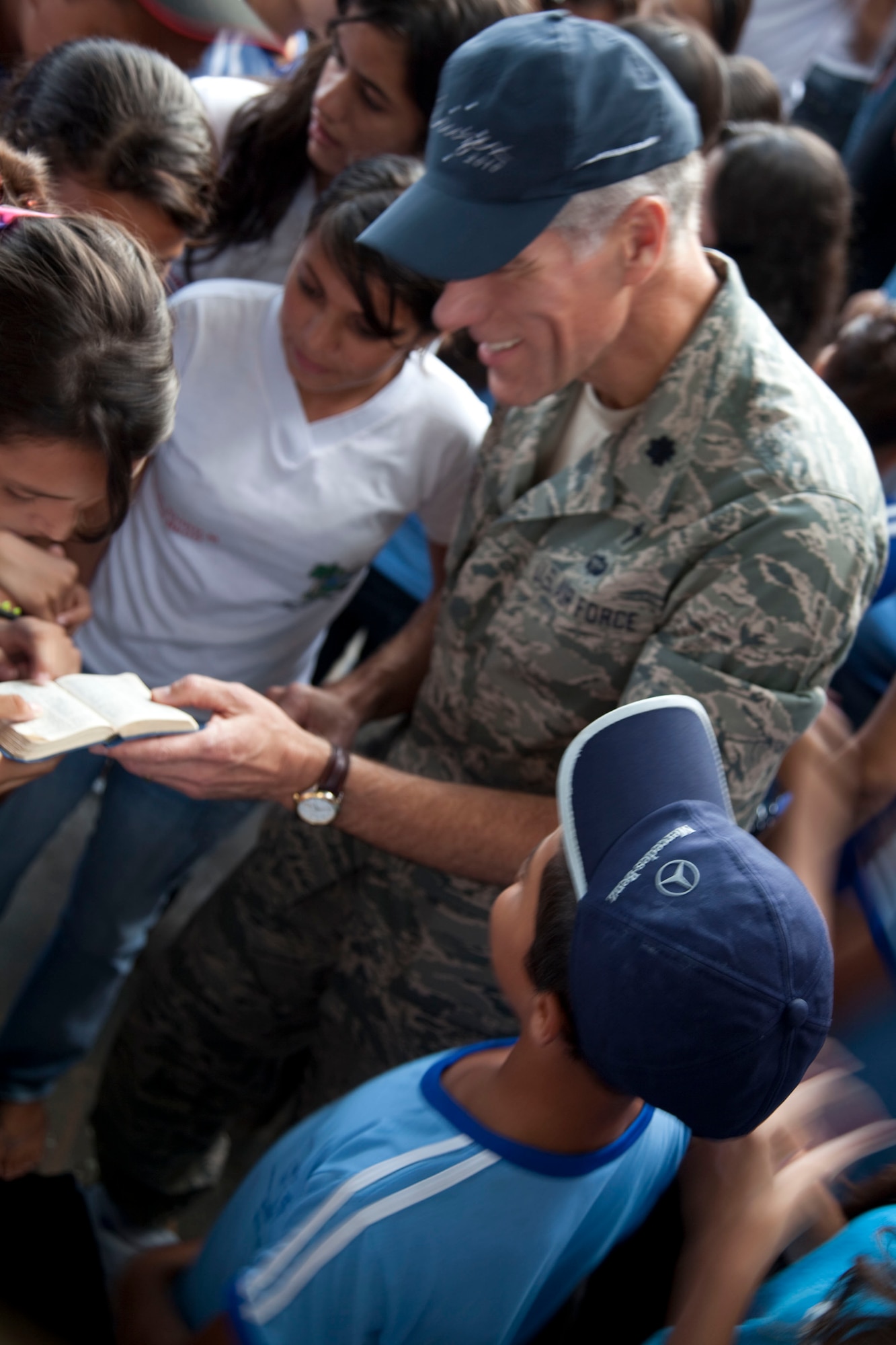 Chaplain (Lt. Col.) Ron Prosise, 140th Wing chaplain, interacts with a local student. A group of more than 15 airmen visited the local school of Eliah Maia do Rego, Natal Brazil, building community relations during CRUZEX V. During the visit the airmen interacted with the students on an informal basis; distributed small gifts and took group pictures. CRUZEX V, or Cruzeiro Do Sul (Southern Cross), is a multi-national combined exercise involving the Air Forces of Argentina, Brazil, Chile, France and Uruguay, , and observers from numerous other countries with more than 82 aircraft and almost 3,000 Airmen involved. (U.S. Air Force photo/Staff Sgt. Michael Matkin)