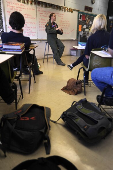 JOINT BASE PEARL HARBOR-HICKAM, Hawaii – Senior Airman Andrea Swank, 535th Airlift Squadron loadmaster, speaks to a class at Lutheran High School, Nov. 10. Members of the Army, Air Force and Navy spoke to students in honor of Veterans Day. (U.S. Air Force photo/Senior Airman Gustavo Gonzalez)