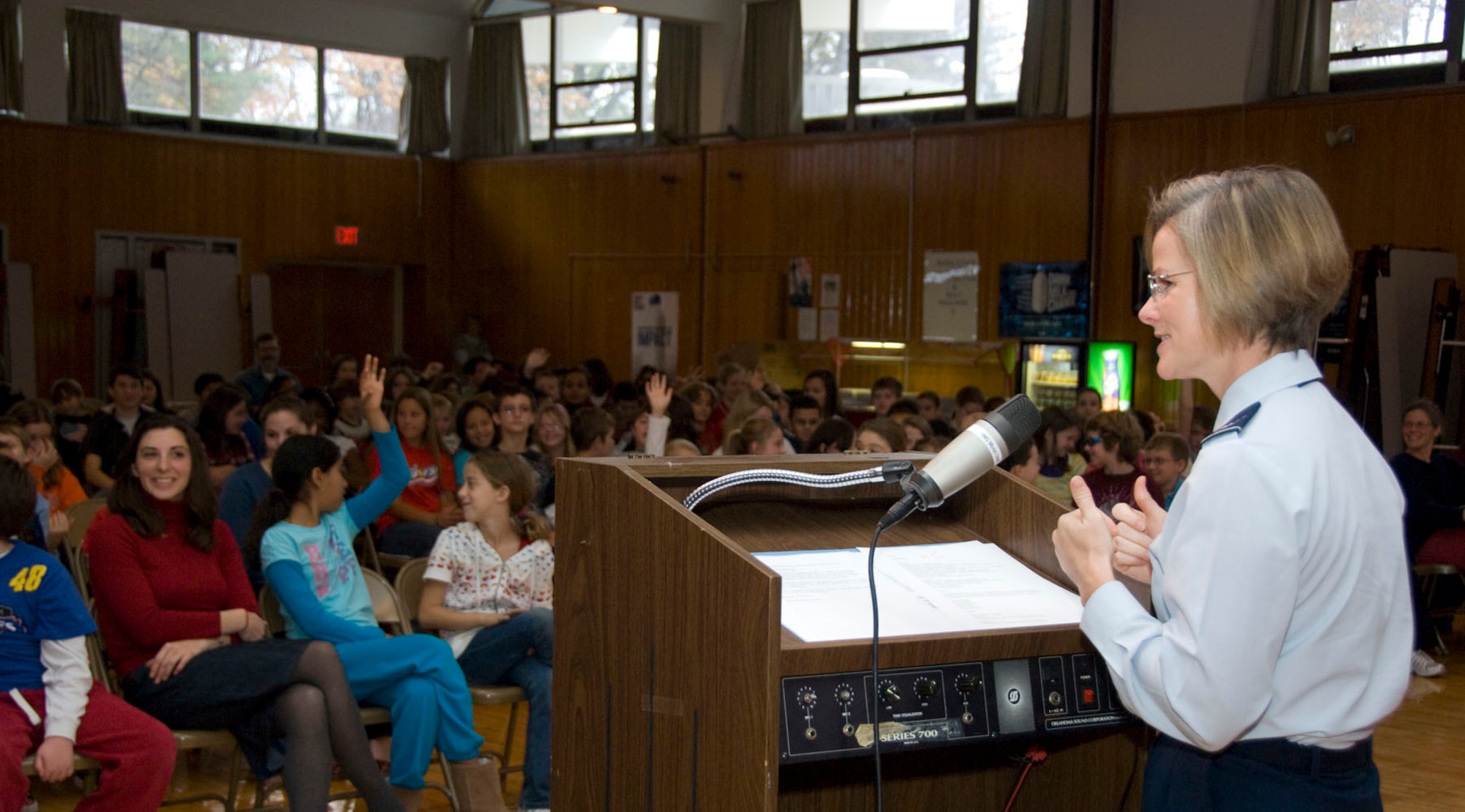 HANSCOM AIR FORCE BASE, Mass. – Col. Stacy L. Yike, 66th Air Base Group commander, speaks to students at Hanscom Middle School about Veterans Day. In addition to speaking, Colonel Yike presented awards and watched a Veterans Day presentation by the students. (U.S. Air Force photo by Mark Herlihy)