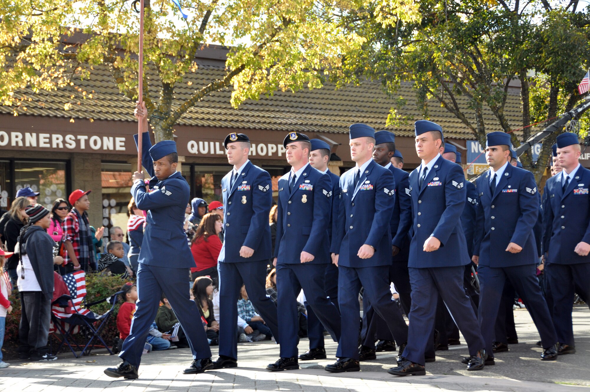 Airman from the Travis Air Force Base, Sgt. Paul P. Ramoneda Airman Leadership School march in formation during the Fairfield,Calif. Veteran's Day Parade Nov. 11. U.S. Air Force Photo/Airman 1st Class Michael Battles.)