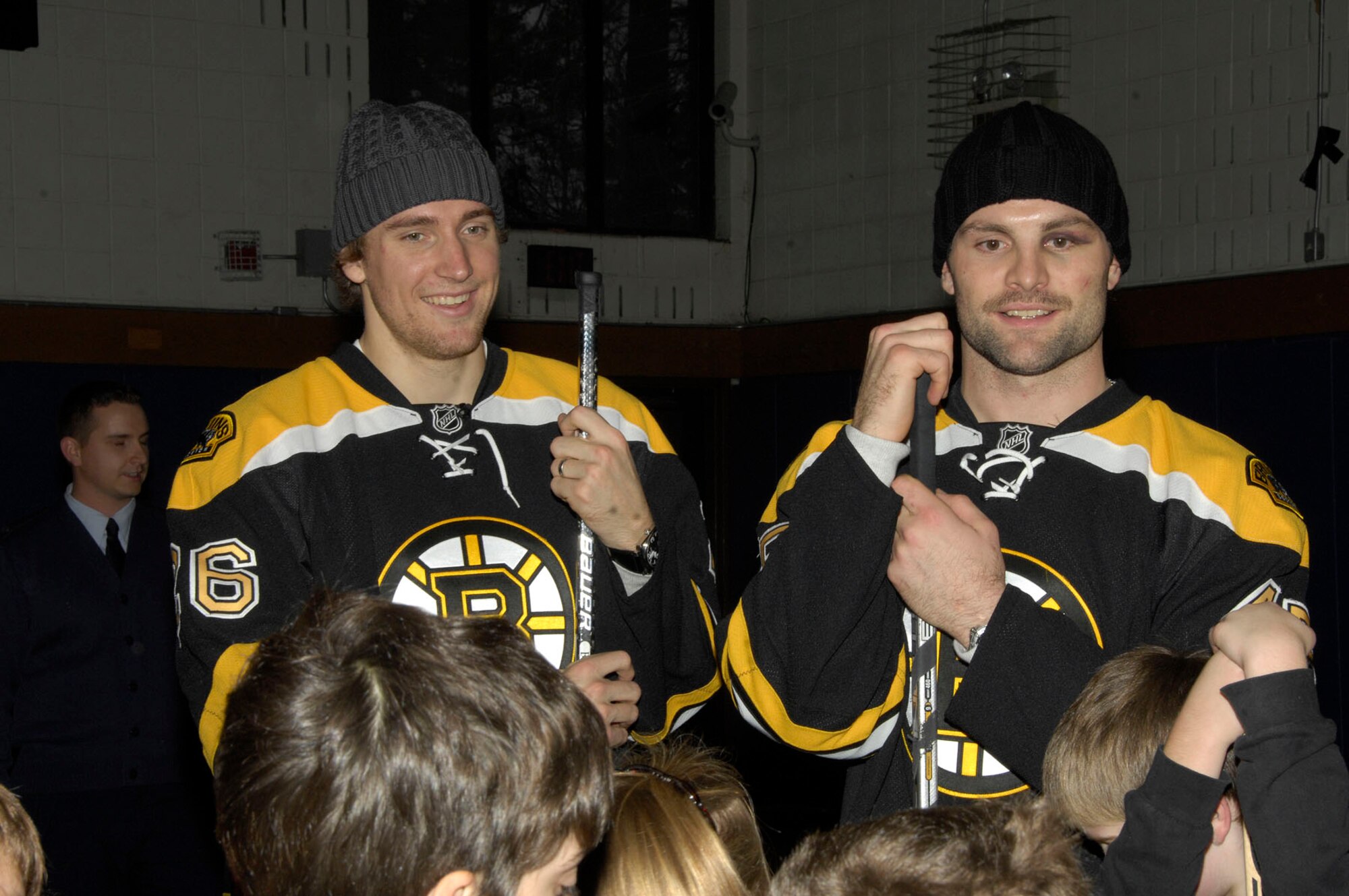 HANSCOM AIR FORCE BASE, Mass. – Blake Wheeler (left) and Mark Stuart, members of the Boston Bruins hockey team, visit with Hanscom youth during a base hockey clinic on Nov. 8. Both Wheeler and Stuart donated $5,000 worth of tickets for local military families to attend the Bruins hockey game on Nov. 15. Military families interested in tickets may visit www.uso-newengland.org or call 617-720-4949. (U.S. Air Force photo by Linda LaBonte Britt)