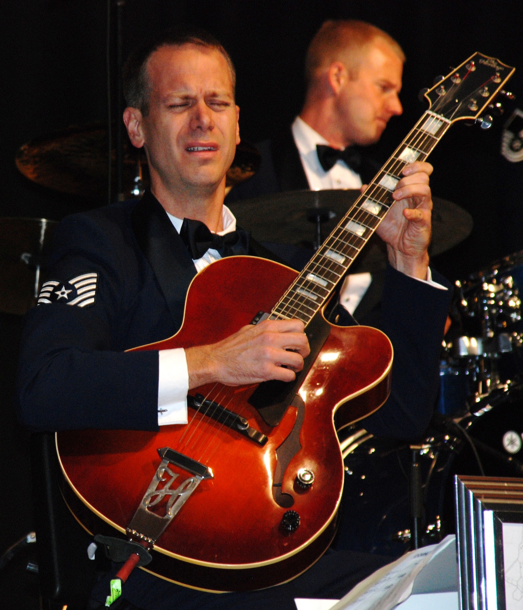 Tech. Sgt. Geoff Reecer plays guitar with the Air Force jazz band, Airmen of Note, at the Chris Grammaticus Auditorium in West Springfield on Veteran's Day. (US Air Force photo/Lt. Col. James Bishop)
