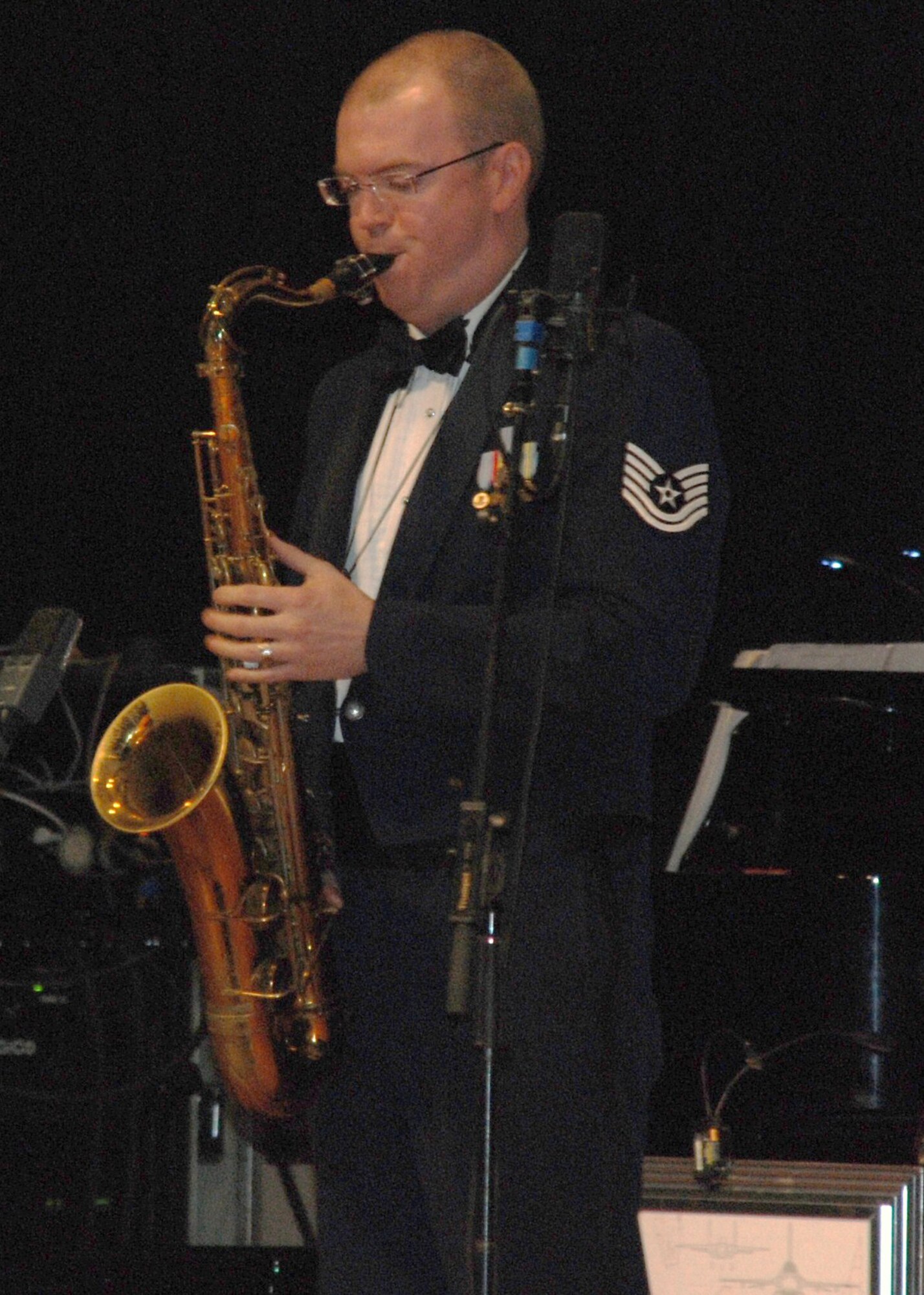 Marshfield, Mass., native and saxophonist Tech. Sgt. Tedd Baker performed with the Air Force jazz band, Airmen of Note, at the Chris Grammaticus Auditorium in West Springfield on Veteran?s Day. The ?Note? features 18 of the most talented jazz musicians in the country and is one of the last touring big bands in the world. (US Air Force photo/Lt. Col. James Bishop)