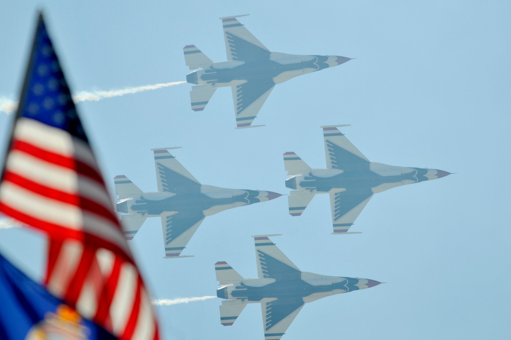 The U.S. Air Force air demonstration team, the Thunderbirds, perform precision aerial maneuvers Nov. 6, 2010, during AirFest 2010 at Lackland Air Force Base, Texas.  (U.S. Air Force photo/Jim Pritchett)