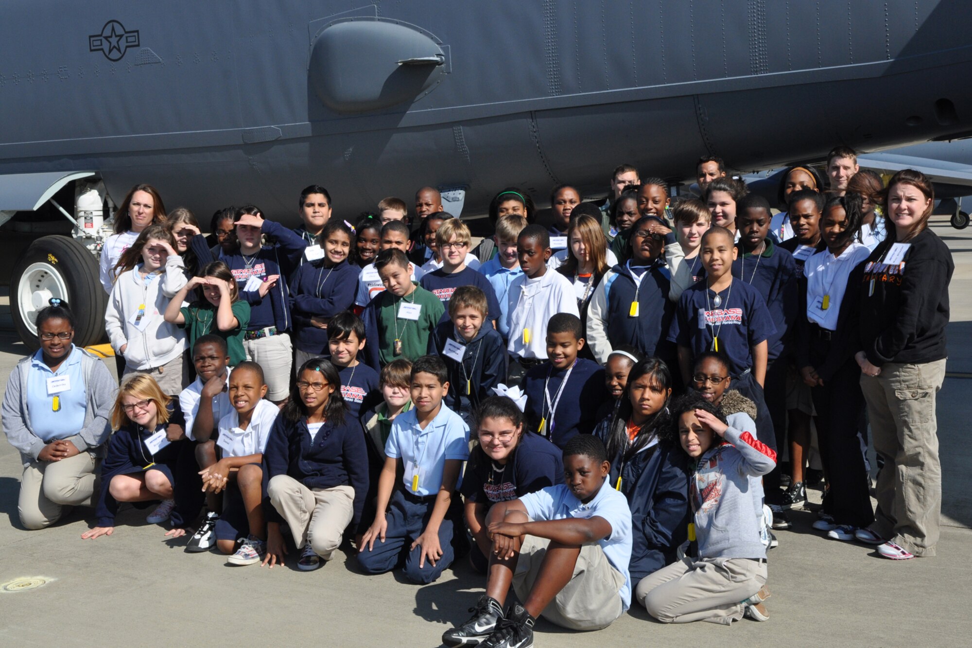 A group of 5th graders from Meadowview Elementary School pose for a class photo during a tour of a B-52 Stratofortress on the ramp at Barksdale Air Force Base, La., Nov. 9, 2010. The Meadowview students are attending STARBASE Louisiana, at Barksdale, one of 60 national STARBASE sites. It is sponsored by the 917th Wing of the Air Force Reserve Command. The program presents an exciting 25-hour hands on/minds on aviation and aerospace curriculum to area 5th grade students and their teachers. The DoD program is committed to addressing the critical needs in STEM education - Science, Technology, Engineering and Mathematics - STARBASE Louisiana introduces its students to exciting STEM education topics, inspiring these young minds to further explore these topics in future course work. Meadowview Elementary is part of the Bossier Parish School System. (U.S. Air Force photo/Betty Stephens)
