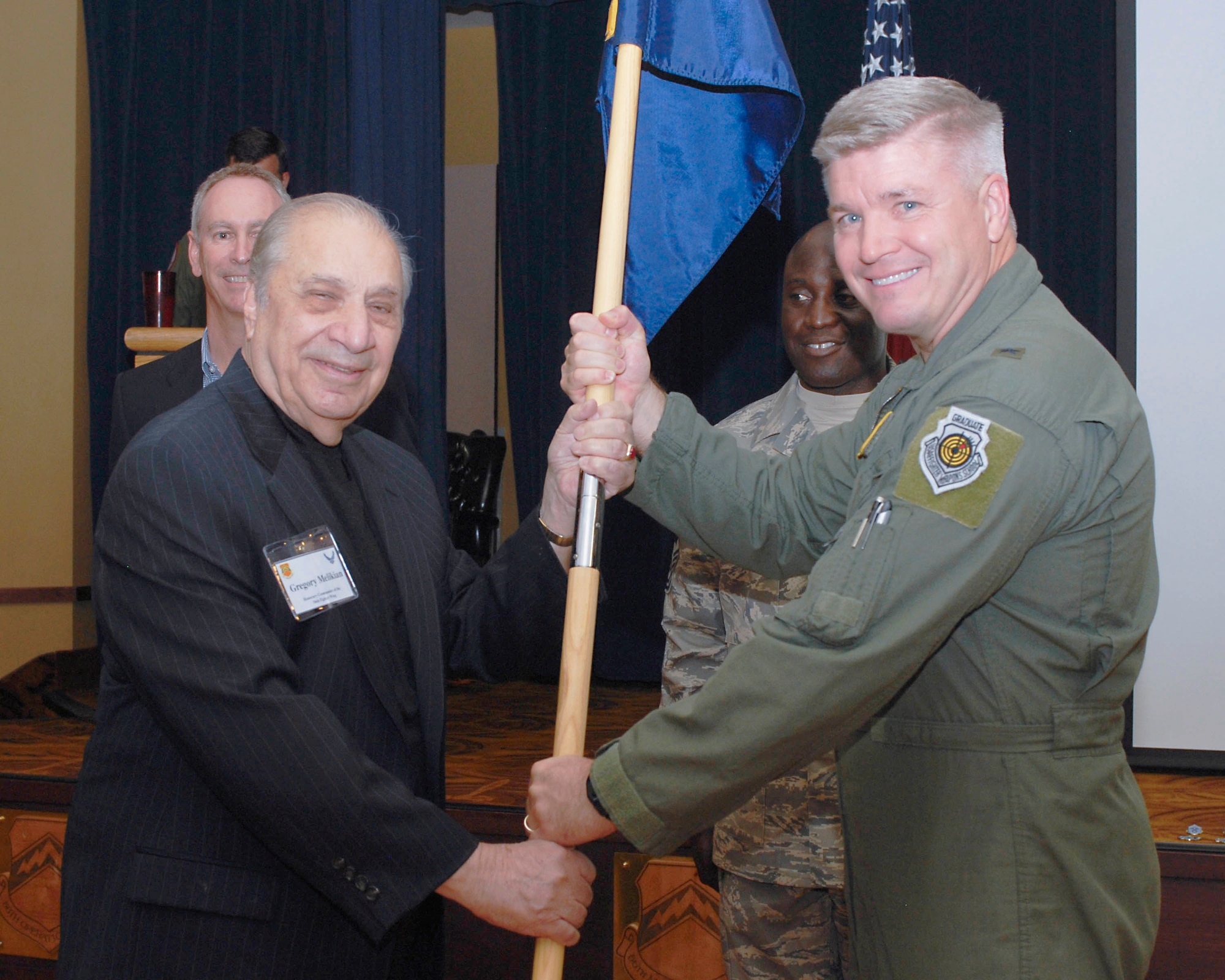 Brig. Gen. J.D. Harris, 56th Fighter Wing commander, poses for a photo with one of his honorary commanders, Gregory Melikian, a lawyer and founder of Great Western Realty Co.  Mr. Melikian holds two honorary commander assignments since he is also assigned to the 944th Fighter Wing commander.  (U.S. Air Force photo/Senior Airman Darlene Seltmann)
