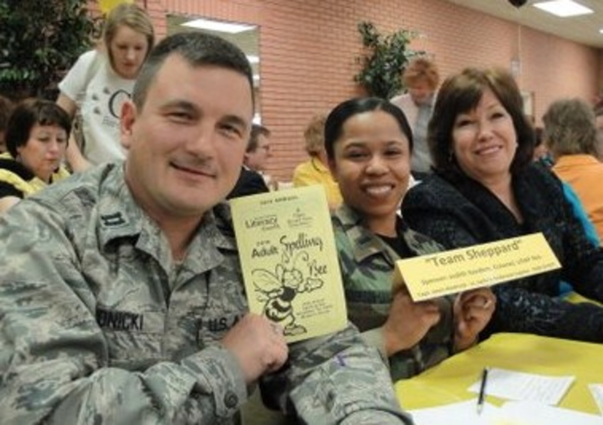 Sheppard Air Force Base participated in the 14th Wichita Falls Adult Literacy Council Spelling Bee on Nov. 10 in Wichita Falls, Texas.  The annual event increases awareness of a 23 percent illiteracy rate in the county, promotes tutoring and fosters education. The three-member team of Capt. Jason Klodnicki, 82nd Training Wing Chapel,1stLt. Jacinto Anderson-Lujano, 82nd TRW Sexual Assault Response Coordinator Office and Debi Smith, 82nd TRW Public Affairs, placed fifth in a field of 22 teams.  (U.S. Air Force Courtesy photo)