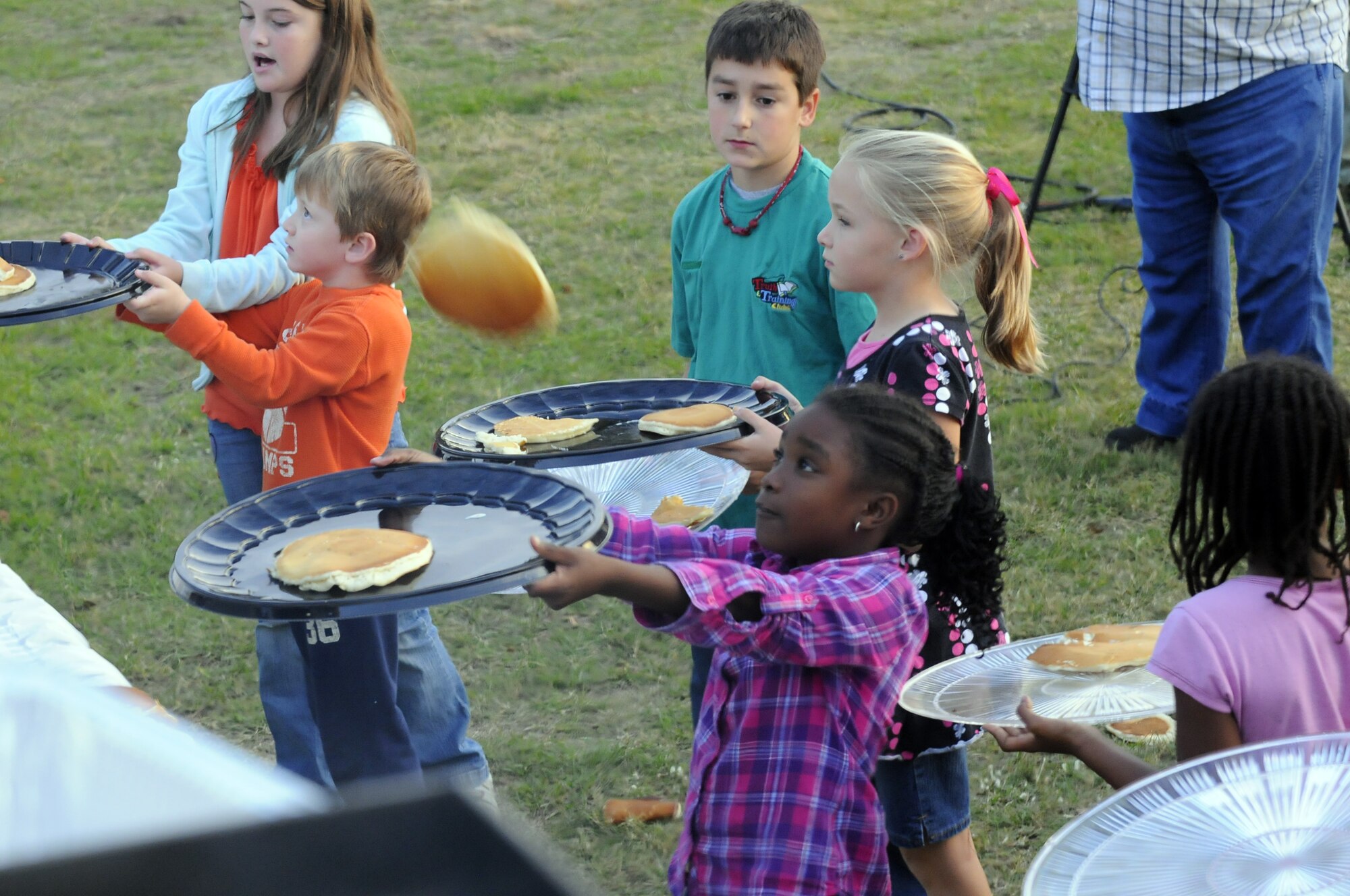 The Robins Chapel and Airmen’s Ministry sponsored a free pancake flip Nov. 10 at Robins Park for Team Robins personnel and family members. Col. Carl Buhler, 78th Air Base Wing commander, said the pancake flip is a 50-year tradition of the U.S. Air Force Air Demonstration Squadron “Thunderbirds.” He served as a maintenance officer with the unit and decided to bring the event to the Robins community. U.S. Air Force Photo by Sue Sapp


