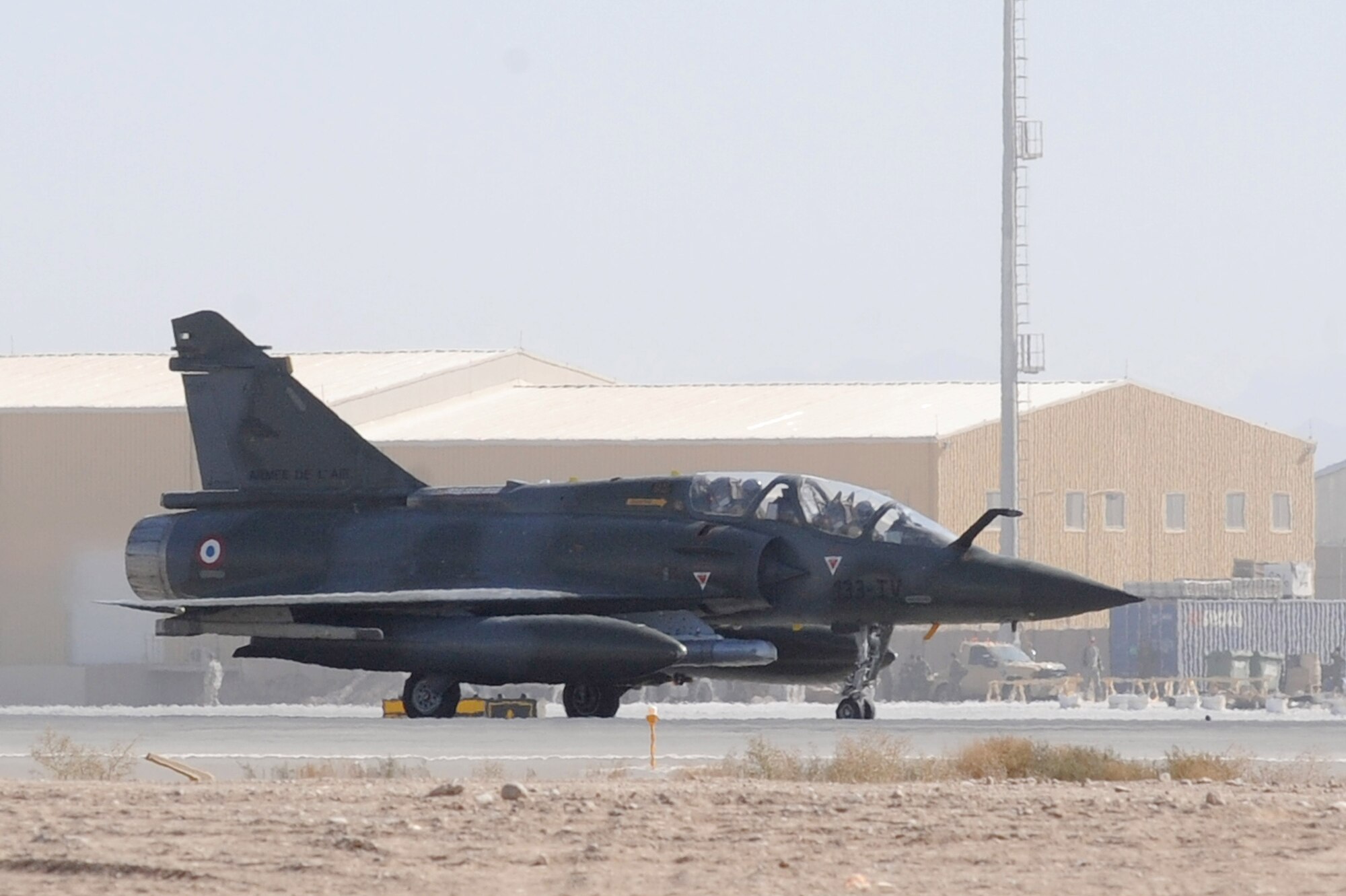 Maj. Skyler Hester and French Air Force Capt. Mathieu Boireau take off for a combat mission in a Mirage 2000D Nov. 11, 2010, at Kandahar Airfield, Afghanistan.  Major Hester from Kalaheo, Hawaii, is an instructor pilot assigned to the French 1/3 Fighter Squadron. He is deployed with the French unit as part of the three-year foreign exchange pilot program. (U.S. Air Force photo by Tech. Sgt. Chad Chisholm/Released)