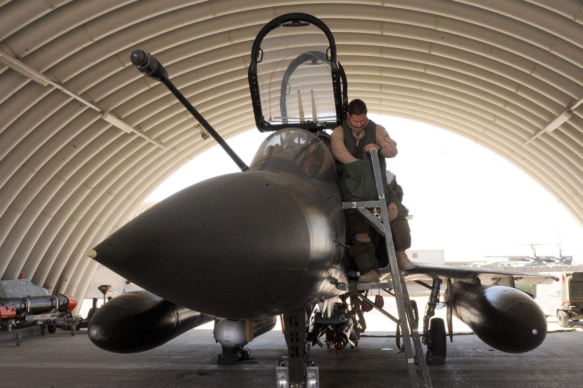 Major Skyler Hester prepares to leave for a combat mission in a Mirage 2000D Nov. 11, 2010, at Kandahar Airfield, Afghanistan.  Major Hester from Kalaheo, Hawaii, is an instructor pilot assigned to the French 1/3 Fighter Squadron.  He is deployed with the French unit as part of the three-year foreign exchange pilot program. (U.S. Air Force photo by Tech. Sgt. Chad Chisholm/Released)