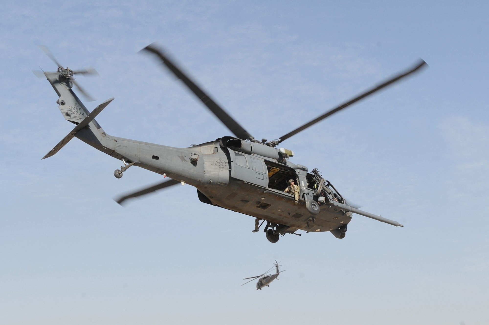 HH-60G Pave Hawk helicopter crews take off for an alert mission Nov. 5, 2010, at Camp Bastion, Afghanistan. The 26th Expeditionary Rescue Squadron uses the HH-60 helicopters to conduct combat search and rescue missions as well as transporting injured military members and Afghan civilians for medical treatment. (U.S. Air Force photo by Tech. Sgt. Chad Chisholm/Released) 