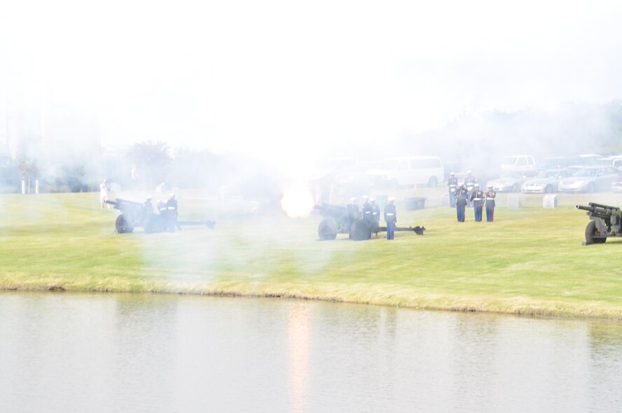 Marines give a cannon salute in honor of those who serve, past and present, at a  Veteran's Day ceremony Thursday, November 11 at Dallas-Fort Worth National Cemetery, Texas. 