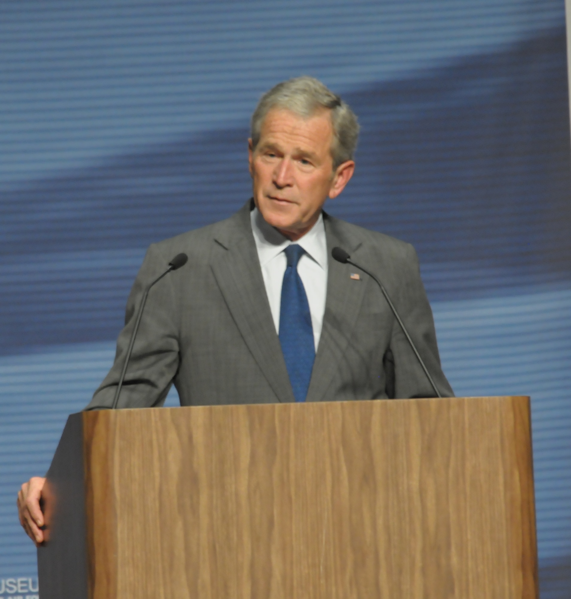 Former President George W. Bush speaks to an audience Nov. 11, 2010, at the National Museum of the U.S. Air Force. President Bush visited the museum on Veterans Day to honor fallen heroes and members of the armed forces, and as part of a stop on his book tour. (U.S. Air Force photo/Al Bright)