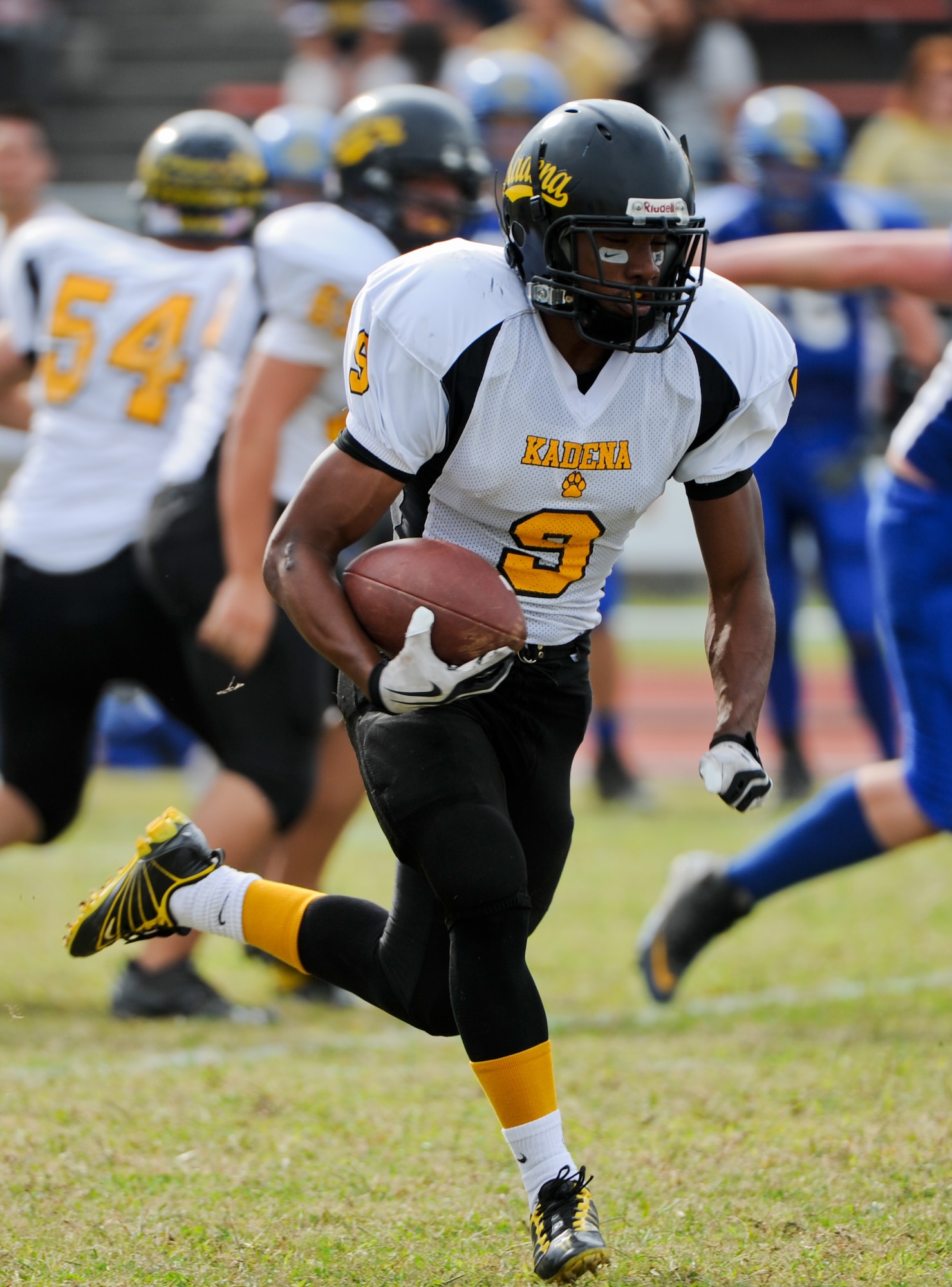 Kadena Panthers running back Thomas McDonald sprint downfield with the ball during the DoDEA Pacific Far East Football Championships Nov 12. The Kadena Panthers beat the Yokota Panthers 50-23 for the Championship. McDonald finished his senior year with 99 carries for 1,033 yards and 19 touchdowns. (U.S. Air Force photo/Staff Sgt. Jonathan Steffen)