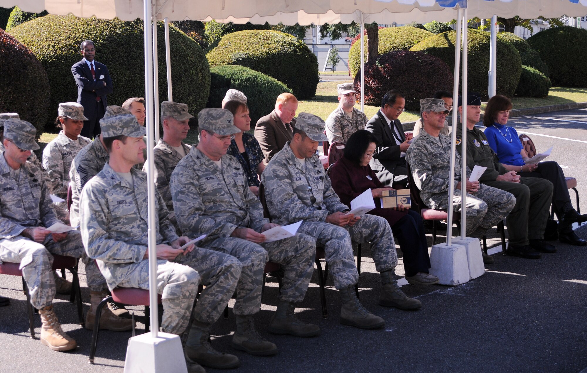 YOKOTA AIR BASE, Japan -- Team Yokota came together to dedicate two cherry blossom trees during a dedication ceremony held outside the Officers' Club, here Nov. 10. The ceremony was held to dedicate two trees to the lasting friendship between the U.S. and Japan, and to Toshiko Aoki-san, who has been working at Yokota since 1970. (U.S. Air Force Photo/ Airman 1st Class Katrina R. Menchaca)