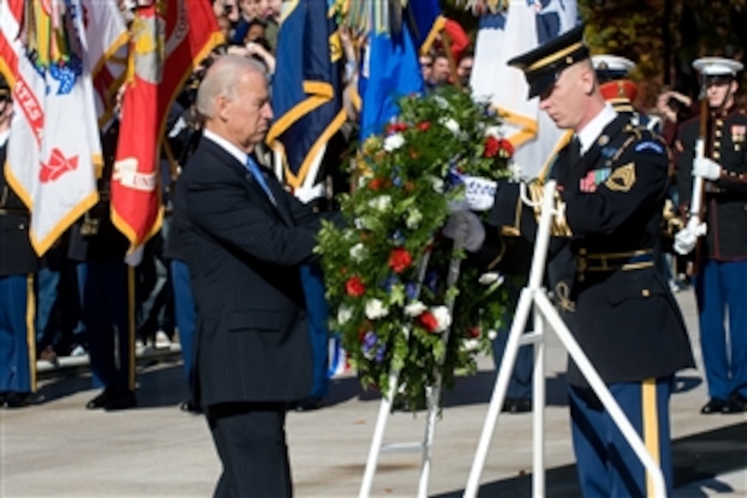 Vice President Joe Biden lays a wreath at the Tomb of the Unknown Soldier during a Veteran's Day ceremony at Arlington National Cemetery on Nov. 11, 2010.  