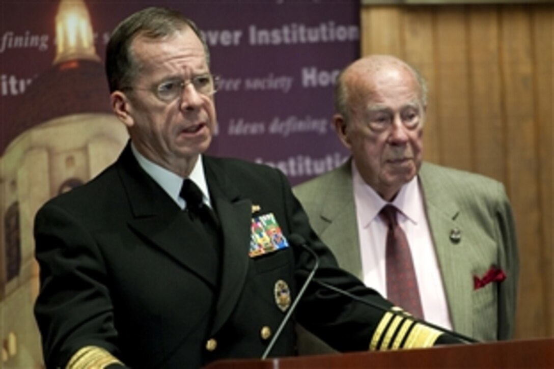 U.S. Navy Adm. Mike Mullen, chairman of the Joint Chiefs of Staff, answers audience members' questions with former Secretary of State George Schultz after Mullen's speech at the Hoover Institution Conference on Nuclear Deterrence at Stanford University in Palo Alto, Calif., Nov. 12, 2010.