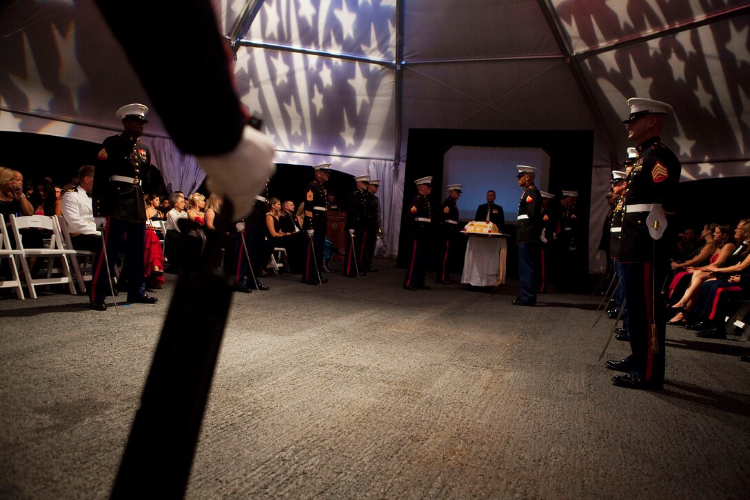Col. James Bierman, commanding officer, 3rd Marine Regiment, commences the cake cutting ceremony during the regiment’s ball on the Battleship Missouri Memorial at Pearl Harbor, Hawaii, Nov. 12, 2010. The infantry regiment, one of the U.S. military’s most deployed units in recent conflicts, celebrated the Marine Corps’ 235th birthday aboard the storied battleship as a beautiful sunset fell beyond the harbor. On Sept. 2, 1945, the Empire of Japan surrendered to Allied forces on the deck of the historic “Mighty Mo” to end World War II.