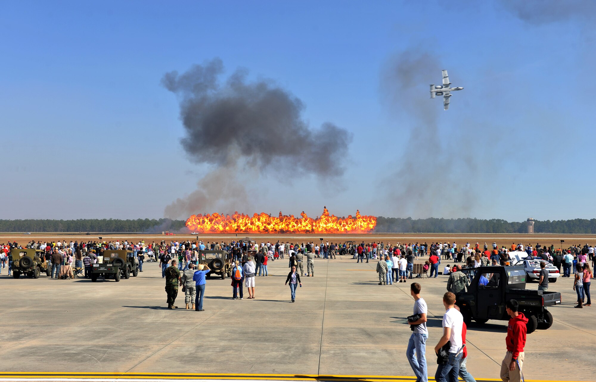 MOODY AIR FORCE BASE, Ga. -- Explosions go off during an A-10C Thunderbolt II demonstration at the Community Appreciation Day Air Show Nov. 13. Moody housed various performers and demonstrations from the A-10 to the P-40 Warhawk, two aircraft that fly with the historic Flying Tigers logo. (U.S. Air Force photo/Airman 1st Class Joshua Green)(RELEASED)
  
