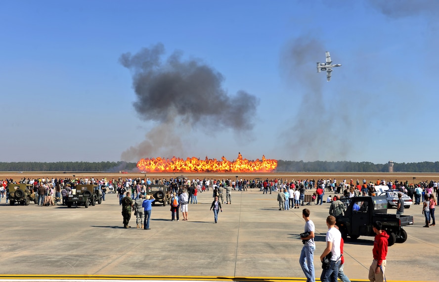 MOODY AIR FORCE BASE, Ga. -- Explosions go off during an A-10C Thunderbolt II demonstration at the Community Appreciation Day Air Show Nov. 13. Moody housed various performers and demonstrations from the A-10 to the P-40 Warhawk, two aircraft that fly with the historic Flying Tigers logo. (U.S. Air Force photo/Airman 1st Class Joshua Green)(RELEASED)
  

