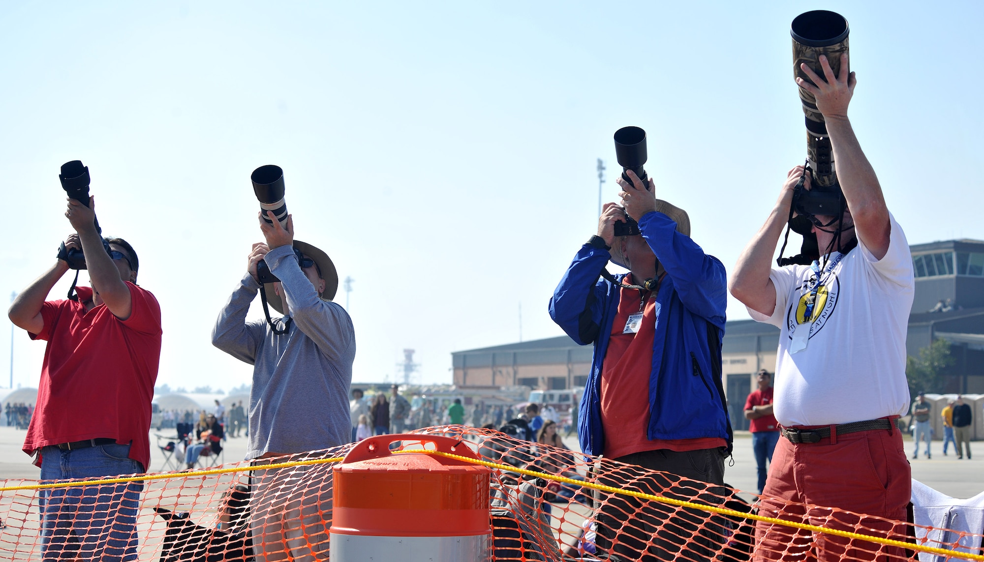 MOODY AIR FORCE BASE, Ga. -- Four Photographers take pictures of aerobatic acts performed at the Community Appreciation day Air Show Nov. 13. The Air Show had 16 acts that came to Moody to perform.  Photographers like these had a chance to see them all in action. (U.S. Air Force photo/Airman 1st Class Joshua Green)(RELEASED)       
