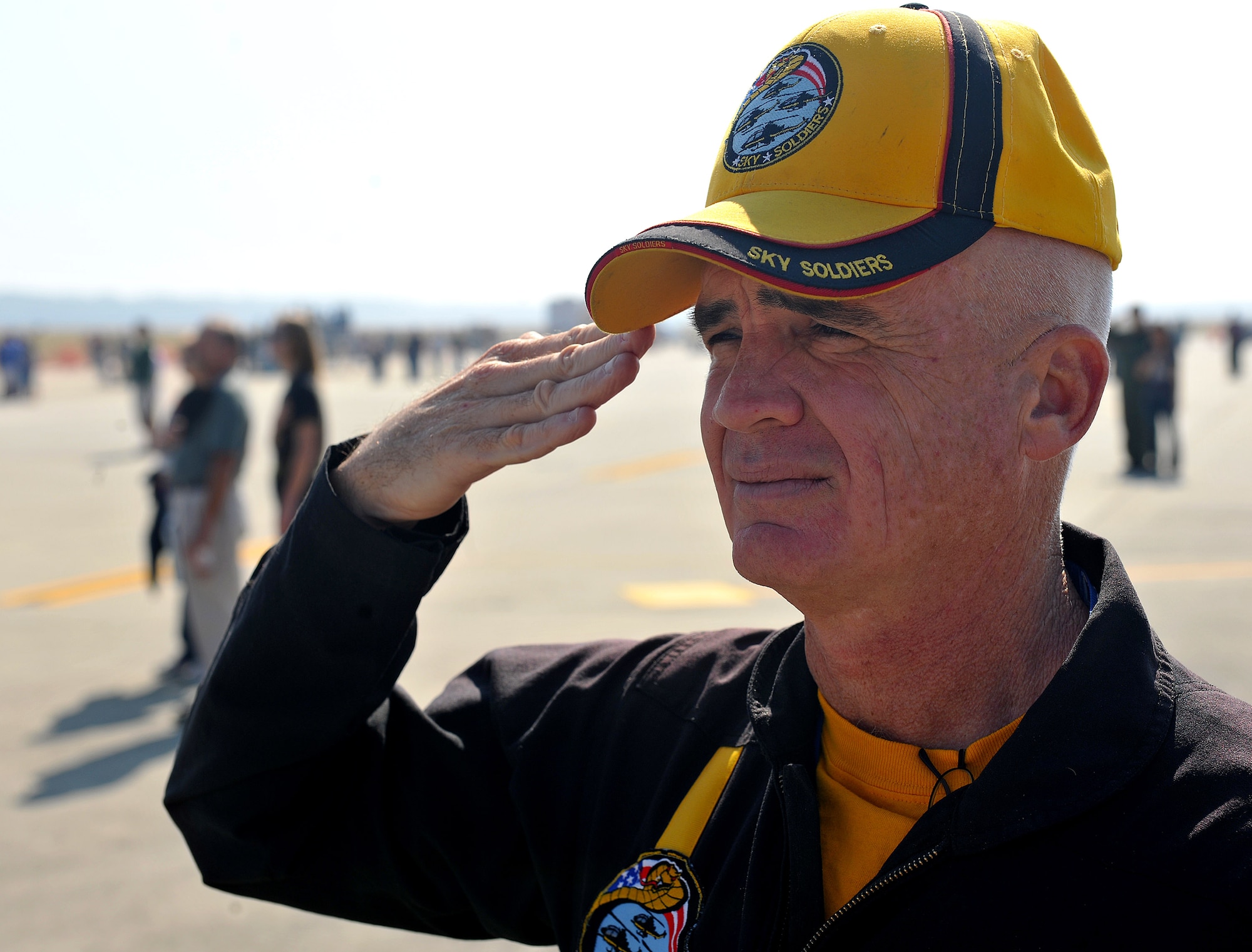 MOODY AIR FORCE BASE, Ga. -- Retired United States Marine Corps Lt. Col. Peyton Dehart, Sky Soldiers Demonstration Team AH-1F Cobra pilot, renders a salute during the singing of the National Anthem at the Community Appreciation day Air Show Nov. 13.  The Sky Soldiers Demonstration Team is attached to the Army Aviation Heritage Foundation (AAHF) and is a national, one-of-a-kind non-profit all-volunteer organization composed of over 1000 Veterans, their families and civilian supporters. (U.S. Air Force photo/Airman 1st Class Joshua Green)(RELEASED)
