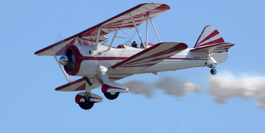 MOODY AIR FORCE BASE, Ga. -- Gary Rower, air show performer, flies his PT-17 Stearman aircraft during Moody’s Community Appreciation Day Air Show Nov. 13. When asked why he enjoys performing at air shows, he replied. “I love performing for large crowds and put smiles on all their faces.” (U.S. Air Force photo/Airman 1st Class Benjamin Wiseman)(RELEASED)
