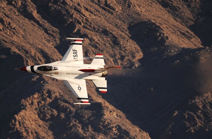 NELLIS AIR FORCE BASE, Nev. The United States Air Force Air Demonstration Squadron "Thunderbirds,"  Lead Solo performs a  high performance turn over Nellis during the 2010 Aviation Nation Nellis Open House Nov. 12, 2010. The Nellis Open House is an opportunity for the Las Vegas community to view aerial demonstrations and static displays of various aircraft from the military. The open house also acts as the final air show of the year for the  U.S. Air Force Air Demonstration Squadron "Thunderbirds." (U.S. Air Force photo/ Master Sgt. Kevin J. Gruenwald)(Released)






