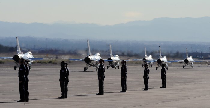 NELLIS AIR FORCE BASE, Nev. -- U.S. Air Force Air Demonstration Squadron, the "Thunderbirds," taxi out to the runway during the 2010 Aviation Nation Nellis Open House Nov. 12.The Nellis Open House is an opportunity for the Las Vegas community to view aerial demonstrations and static displays of various aircraft from the military. The open house also acts as the final air show of the year for the  U.S. Air Force Air Demonstration Squadron "Thunderbirds."  (U.S. Air Force photo by Airman 1st Class Daniel Hughes/Released)