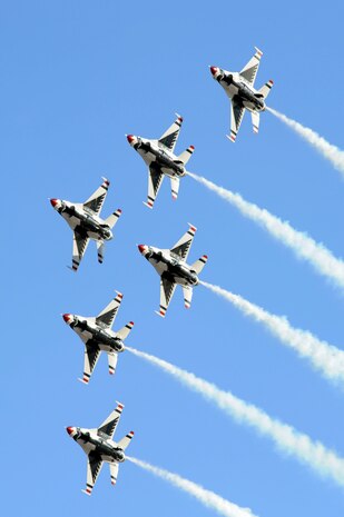 NELLIS AIR FORCE BASE, Nev.-- The U.S. Air Force Air Demonstration Squadron "Thunderbirds," perform the Delta Pass and Review over Nellis during the 2010 Aviation Nation Nellis Open House Nov. 12, 2010. The Nellis Open House is an opportunity for the Las Vegas community to view aerial demonstrations and static displays of various aircraft from the military. The open house also acts as the final air show of the year for the  U.S. Air Force Air Demonstration Squadron "Thunderbirds." (U.S. Air Force photo / Airman 1st Class Matthew Lancaster)(Released)
