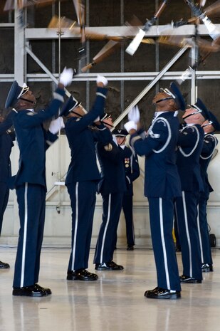 NELLIS AIR FORCE BASE, Nev.-- The U.S. Air Force Honor Guard Drill Team performs for local Las Vegas students and their families during Flightline Frenzy, on Nov. 12, 2010. The performance was  part of the 2010 Aviation Nation Nellis Open House. (U.S. Air Force Photo by Airman 1st Class Jamie Nicley)(Released)