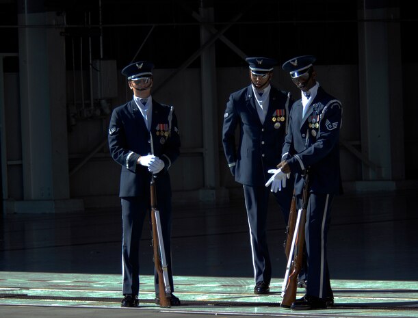 NELLIS AIR FORCE BASE, Nev.-- The U.S. Air Force Honor Guard Drill Team preps before a demonstration on Nov. 13, 2010. The performance was  part of the 2010 Aviation Nation Nellis Open House. The weekend event is an opportunity for the Las Vegas community to view aerial demonstrations and static displays of various aircraft from the military. The open house also acts as the final air show of the year for the  U.S. Air Force Air Demonstration Squadron "Thunderbirds." (U.S. Air Force photo/ Master Sgt. Kevin J. Gruenwald)(Released)



