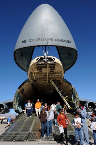 NELLIS AIR FORCE BASE, Nev. -- Visitors walk through a C-5 Galaxy during the 2010 Aviation Nation Nellis Open House Nov. 13. The Nellis Open House is an opportunity for the Las Vegas community to view aerial demonstrations and static displays of various aircraft from the military. The open house also acts as the final air show of the year for the  U.S. Air Force Air Demonstration Squadron "Thunderbirds." (U.S. Air Force photo by Senior Airman Brett Clashman)(Released)