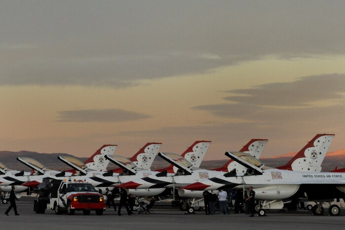 NELLIS AIR FORCE BASE, Nev. -- U.S. Air Force Air Demonstration Squadron "Thunderbirds." prepare Thunderbird F-16's for their final performance of the year at 2010 Aviation Nation Nellis Open House Nov. 13.The open House is an opportunity for the Las Vegas community to view aerial demonstrations and static displays of various aircraft from the military. The open house also acts as the final air show of the year for the  U.S. Air Force Air Demonstration Squadron "Thunderbirds." (U.S. Air Force photo by Airman 1st Class Daniel Hughes/Released)