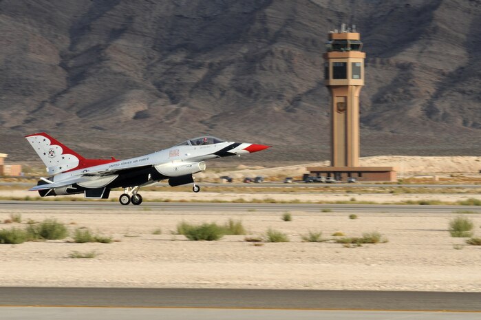 NELLIS AIR FORCE BASE, Nev. -- U.S. Air Force Air Demonstration Squadron, "Thunderbirds," Thunderbird #2 lands on the Nellis runway after completing an aerial performance at the 2010 Aviation Nation Nellis Open House Nov. 13. The open house is an opportunity for the Las Vegas community to view aerial demonstrations and static displays of various aircraft from the military. The open house also acts as the final air show of the year for the  U.S. Air Force Air Demonstration Squadron "Thunderbirds." (U.S. Air Force photo by Airman 1st Class Daniel Hughes/Released)