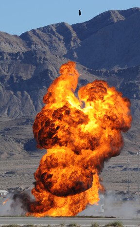 NELLIS AIR FORCE BASE, Nev.--  Pyrotechnics explode during a Vietnam era reenactment at the 2010 Aviation Nation Nellis Open House Nov. 13.  The Open House is an opportunity for the Las Vegas community to view aerial demonstrations and static displays of various aircraft from the military. The open house also acts as the final air show of the year for the  U.S. Air Force Air Demonstration Squadron "Thunderbirds."  (U.S Air Force Photo / Airman 1st Class Matthew Lancaster)(Released)