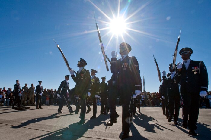 NELLIS AIR FORCE BASE, Nev.-- The U.S. Air Force Honor Guard Drill Team from Bolling Air Force Base, Washington D.C. perform on the Nellis flightline Nov. 13, 2010. The performance was  part of the 2010 Aviation Nation Nellis Open House. The weekend long event is an opportunity for the Las Vegas community to view aerial demonstrations and static displays of various aircraft from the military. The open house also acts as the final air show of the year for the Thunderbirds. (U.S. Air Force photo by Tech. Sgt. Michael R. Holzworth)(Released)