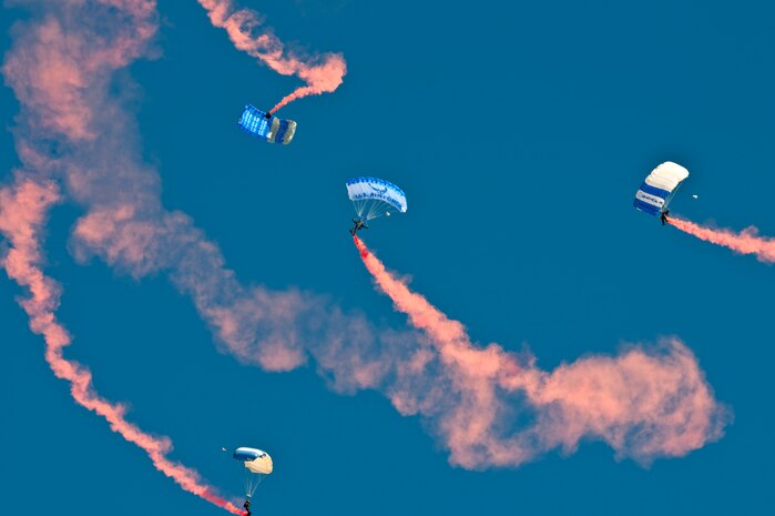 NELLIS AIR FORCE BASE, Nev. -  The U.S. Air Force Academy Parachute Team "Wings of Blue" combined cadet and instructor demonstration team perform during the Aviation Nation Nellis Open House Nov. 13.  The Nellis Open House is an opportunity for the Las Vegas community to view aerial demonstrations and static displays of various aircraft from the military. The open house also acts as the final air show of the year for the  U.S. Air Force Air Demonstration Squadron "Thunderbirds." (U.S. Air Force photo by Tech. Sgt. Michael R. Holzworth)(Released)
