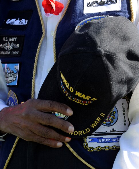 VALDOSTA, Ga. -- A World War II veteran covers his heart with his hat as a moment of silence is rendered for prisoners of war and missing in action veterans during a Veteran’s Day ceremony Nov. 11. Veterans are recognized and honored every year on Nov. 11, as it has been proclaimed as National Veteran’s Day. (U.S. Air Force photo/Airman 1st Class Benjamin Wiseman)(RELEASED)