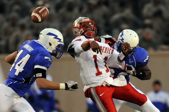 New Mexico quarterback Stump Godfrey is hit by Air Force's Bradley Connor during the Air Force-New Mexico game at Falcon Stadium Nov. 13, 2010. The Falcons defeated the Lobos, 48-23, in their final home game of the season. The Falcons, 7-4 overall and 4-3 in the Mountain West Conference, close out their regular season against UNLV Nov. 18. (Air Force photo/Johnny Wilson)