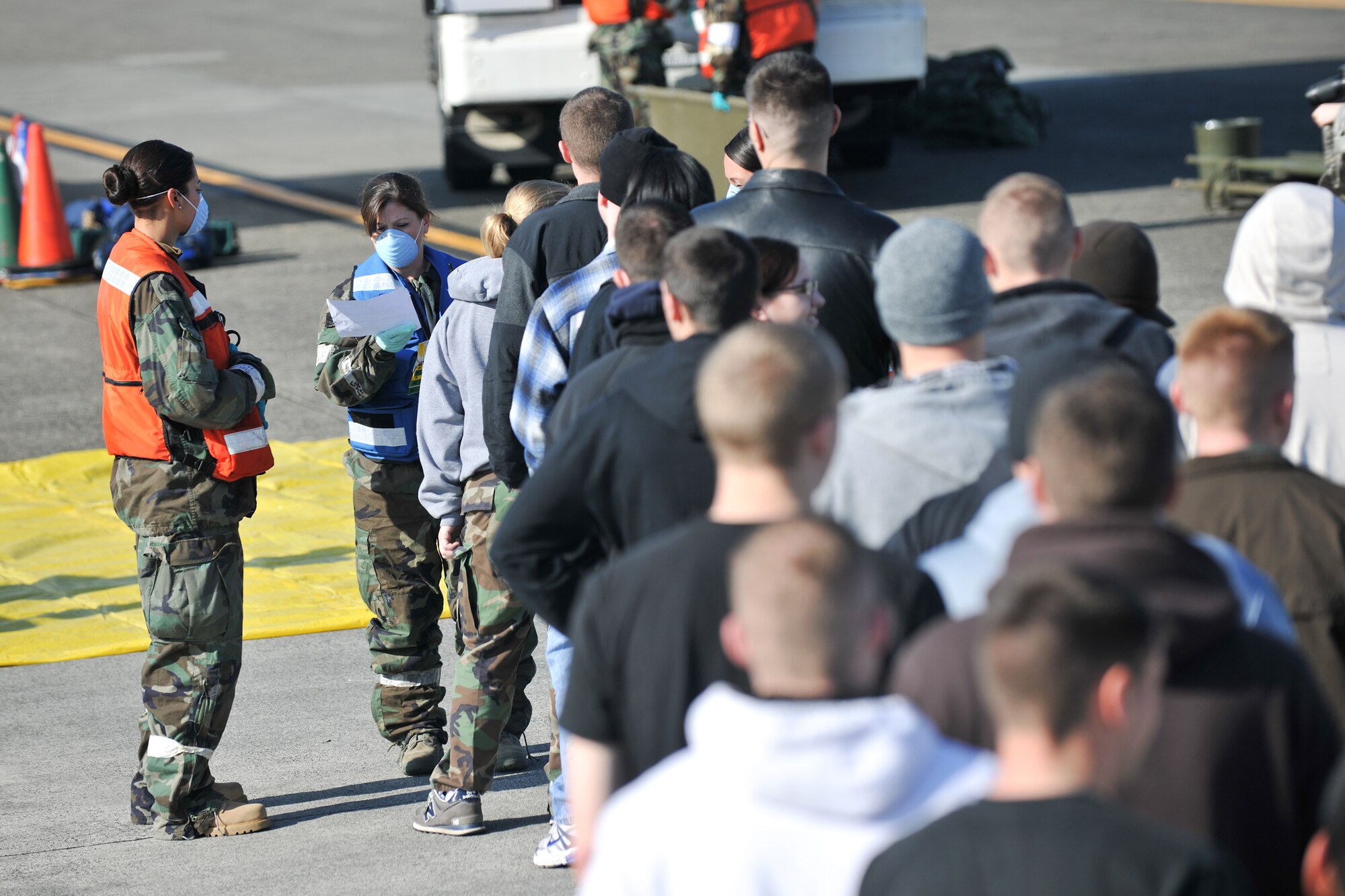 YOKOTA AIR BASE, Japan -- Capt. Suzanne Depaulo, 374th Medical Operations Squadron, performs TRIAGE on simulated patients here Nov. 16 during an Emergency Management Exercise aimed to ensure Team Yokota is prepared to respond at a moment's notice. (U.S. Air Force photo/Osakabe Yasuo)