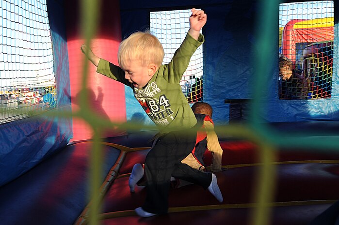 NELLIS AIR FORCE BASE, Nev.--  Elijah Weir plays inside an jumping castle at the 2010 Aviation Nation Nellis Open House Nov. 14. The Nellis Open House is an opportunity for the Las Vegas community to view aerial demonstrations and static displays of various aircraft from the military. The open house also acts as the final air show of the year for the U.S. Air Force Air Demonstration Squadron, "Thunderbirds." (U.S Air Force Photo / Senior Airman Stephanie Rubi) (Released)