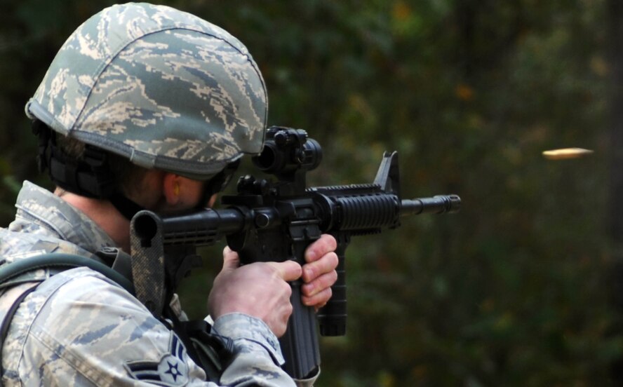 Airman 1st Class Joseph Mcilrath, 7th Security Forces Squadron from Dyess Air Force Base, Texas, fires his weapon during the M4 challenge portion of the Global Strike Challenge at Fort Polk, La., Nov. 14. The event is the world's premier bomber, Intercontinental Ballistic Missile and security forces competition with units from Air Force Global Strike Command, Air Combat Command, Air Force Reserve Command and the Air National Guard. (U.S. Air Force photo/Senior Airman Brittany Y. Bateman)(RELEASED)
