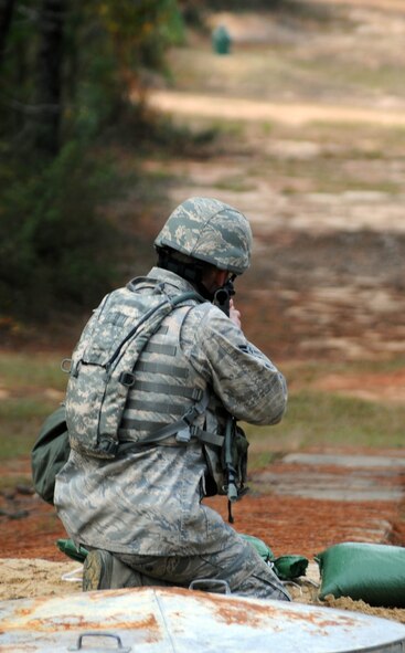 Airman 1st Class Andrew Beyer, 2nd Security Forces Squadron from Barksdale Air Force Base, La., fires his weapon at a target during the M4 challenge portion of the Global Strike Challenge at Fort Polk, La., Nov. 14.  More than 400 participants took part in GSC competitions at various locations on base. Teams have the opportunity to display their innovative thinking, teamwork and esprit de corps that are central to the GSC mission. (U.S. Air Force photo/Senior Airman Brittany Y. Bateman)(RELEASED)