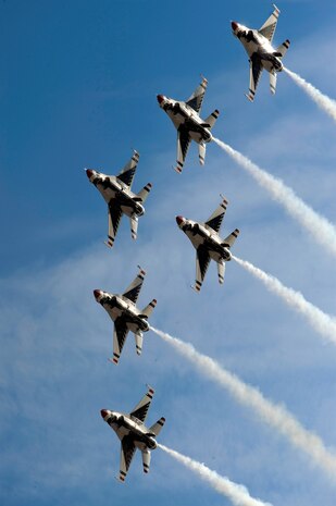 NELLIS AIR FORCE BASE, Nev.-- The U.S. Air Force Air Demonstration Squadron Thunderbirds perform the Delta Pass and Review over Nellis during the 2010 Aviation Nation Nellis Open House  Nov. 14. The Nellis Open House is an opportunity for the Las Vegas community to view aerial demonstrations and static displays of various aircraft from the military. The open house also acts as the final air show of the year for the U.S. Air Force Air Demonstration Squadron, "Thunderbirds." (U.S. Air Force photo by Senior Airman Brett Clashman)(Released)