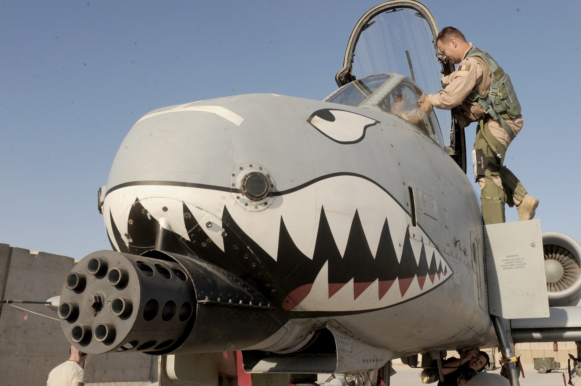 French air force Maj. Yann Malard exits an A-10C Thunderbolt II after a mission Nov. 10, 2010, at Kandahar Airfield, Afghanistan. Major Malard is an assistant duty officer with the 75th Expeditionary Fighter Squadron. He is deployed with the American unit as part of the three-year foreign exchange pilot program. (U.S. Air Force photo/Tech. Sgt. Chad Chisholm)
