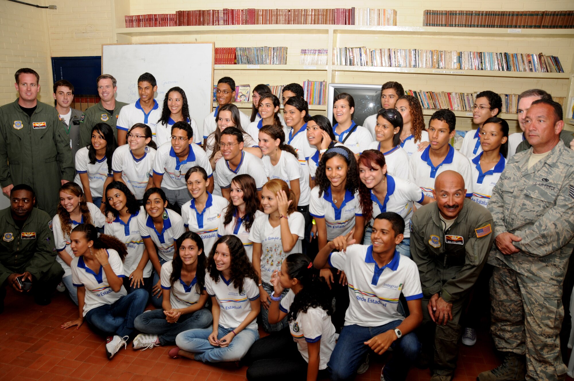 Members of the 161St Air Refueling Wing, Phoenix, Ariz.,pose with students from Escola Santos Dumont School on November 11, 2010, in Recife, Brazil . The 161st ARW is participating in CRUZEX V, or Cruzeiro Do Sul (Southern Cross).  CRUZEX  is a multi-national combined exercise involving the Air Forces of Argentina, Brazil, Chile, France and Uruguay, and observers from numerous other countries with more than 82 aircraft and almost 3,000 Airmen involved.  U.S. Air Force Photo by Master Sgt. Kelly M. Deitloff