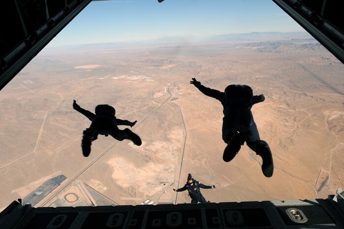NELLIS AIR FORCE BASE, Nev. -- The  U.S. Air Force Academy parachute team, Wings of Blue, jump out the back of a C-130 Hercules during the 2010 Aviation Nation Nellis Open House Nov. 14. The Nellis Open House is an opportunity for the Las Vegas community to view aerial demonstrations and static displays of various aircraft from the military. The open house also acts as the final air show of the year for the U.S. Air Force Air Demonstration Squadron, "Thunderbirds." (U.S. Air Force photo by Senior Airman Brett Clashman)(Released)