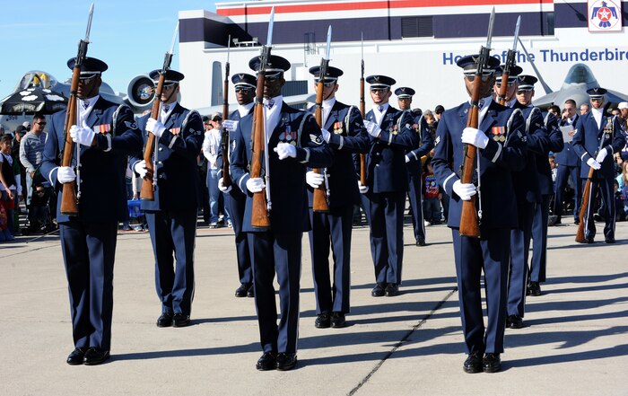NELLIS AIR FORCE BASE, Nev.-- The U.S. Air Force Honor Guard Drill team from Bolling Air Force base Washington D.C.  perform at the 2010 Aviation Nation Nellis Open House Nov. 14. The Open House is an opportunity for the Las Vegas community to view aerial demonstrations and static displays of various aircraft from the military. The open house also acts as the final air show of the year for the U.S. Air Force Air Demonstration Squadron, "Thunderbirds." (U.S Air Force Photo / Airman 1st Class Matthew Lancaster) (Released)