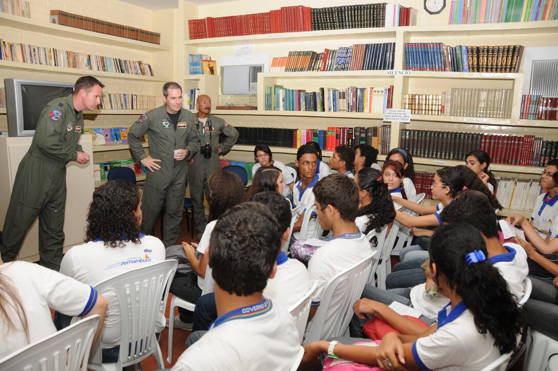 Captain Travis Grantham, Major Quinn Casey and Master Sgt. Johnny Narro from the 161st Air Refueling Wing, Phoenix, Ariz., talk with students from Escola Santos Dumont School on November 11, 2010, in Recife, Brazil . The 161st ARW is participating in CRUZEX V, or Cruzeiro Do Sul (Southern Cross).  CRUZEX  is a multi-national combined exercise involving the Air Forces of Argentina, Brazil, Chile, France and Uruguay, and observers from numerous other countries with more than 82 aircraft and almost 3,000 Airmen involved.  U.S. Air Force Photo by Master Sgt. Kelly M. Deitloff